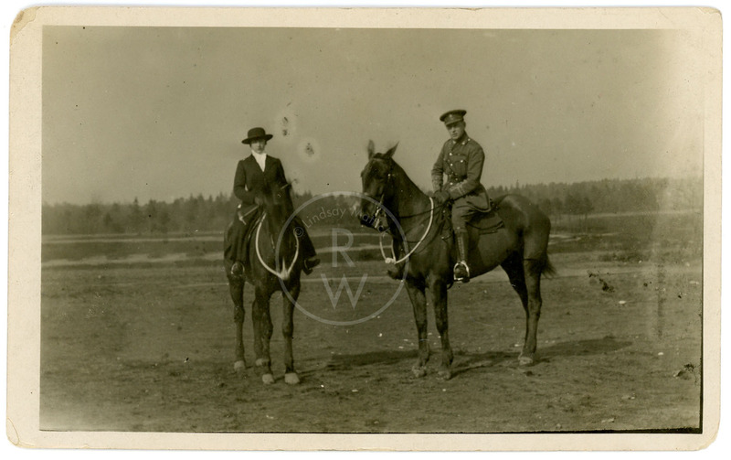 Harry Colebourn on horseback with friend