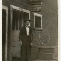 Harry Colebourn standing outside his veterinary practice